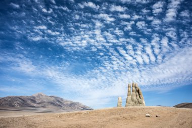 Hand Sculpture, the symbol of Atacama Desert in Chile clipart