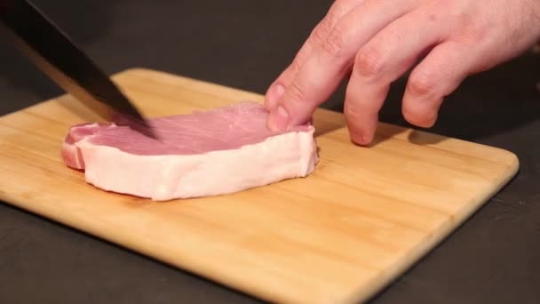 Male Chef Cuts Piece Steak Pork Knife Chopping Board Close — Vídeos de Stock