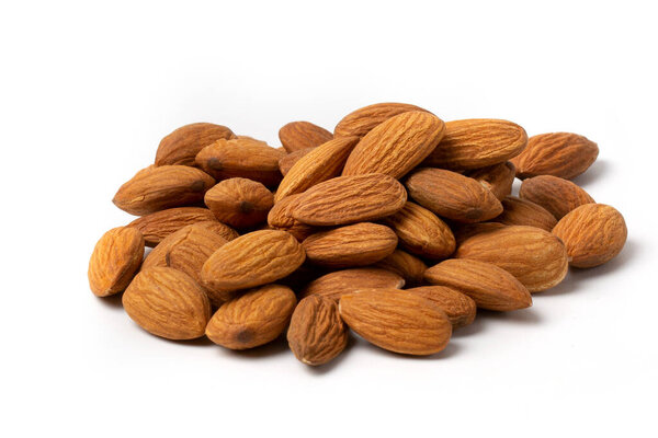 Close-up of almonds on a white background.