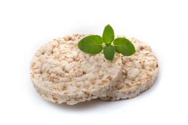 Nane yaprağıyla süslenmiş kahvaltı dilimleri şeklinde yulaf ezmesi. Sağlıklı beslenme.