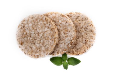 Nane yaprağıyla süslenmiş kahvaltı dilimleri şeklinde yulaf ezmesi. Sağlıklı beslenme.