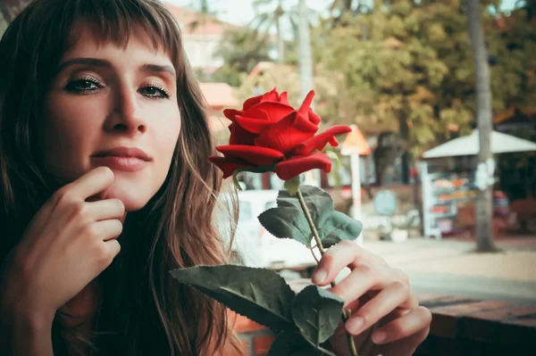 Girl with flowers — Stock Photo, Image