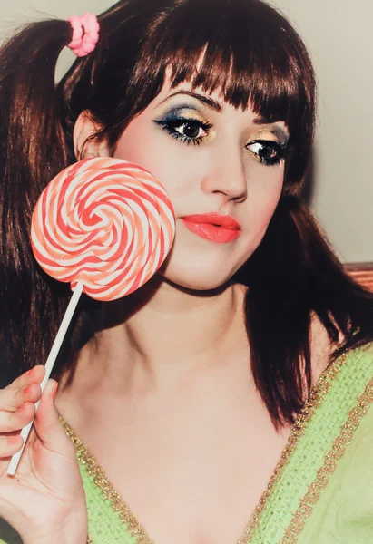 Chica con dulces — Foto de Stock