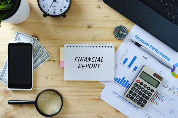 Word FINANCIAL REPORT written on notepad. — Stock Photo, Image