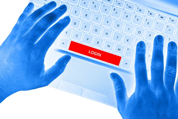 Hænder på bærbar computer med "LOGIN" ord på mellemrumstasten knap . - Stock-foto