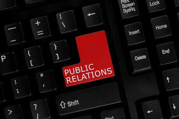 Close-up view of computer keyboard with Public Relations words on keyboard button. — Stock Photo, Image