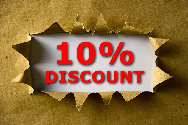 Torn brown paper with 10% DISCOUNT words — Stock fotografie