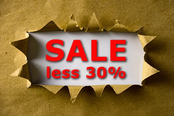Zerrissenes braunes Papier mit Verkauf weniger 30% Wörter — Stockfoto