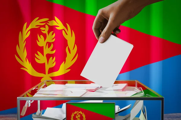 Eritrea Vlag Hand Laten Vallen Stemkaart Een Doos Stemming Verkiezingsconcept — Stockfoto