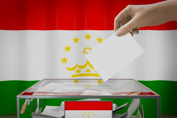 Σημαία Τατζικιστάν Χέρι Ρίχνοντας Την Κάρτα Ένα Κουτί Ψηφοφορία Εκλογική — Φωτογραφία Αρχείου