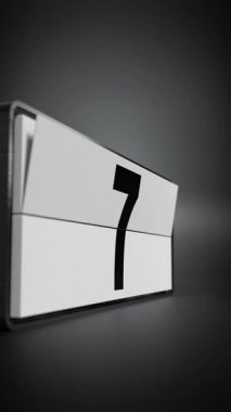 Takvim 1 'den 31' e seçici odak ile ayın günlerini değiştiriyor - 3D 4k dikey animasyon (2160 x 3840 px)