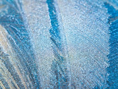 Kışın camdaki buz kalıplarının dokusu..