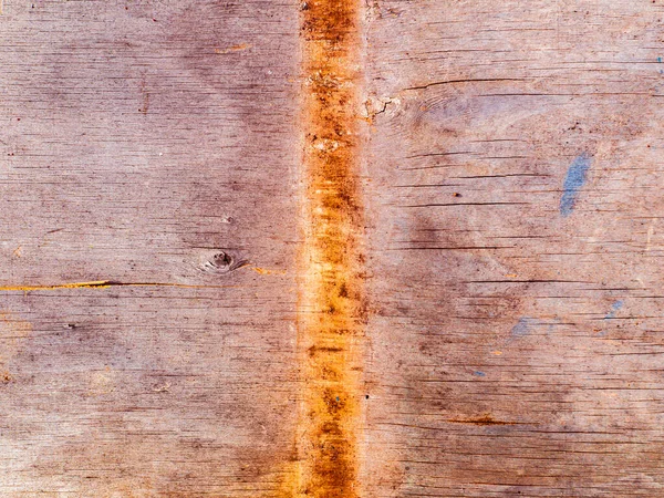 Texture fanée d'une surface de planche en bois avec des taches rouillées. — Photo