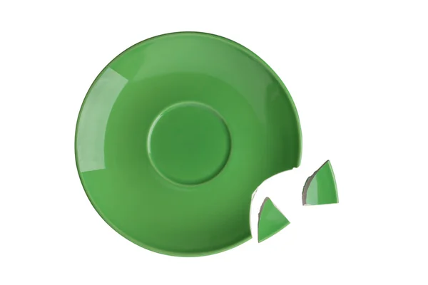 Зламана зелена тарілка на білому тлі — стокове фото
