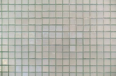 Havuzun duvarlarına, banyoya, mutfağa, döşemeye bakan dokusu. Kare arka plan mozaiği, seramik. Soyut pikseller. Seramik fayanslar