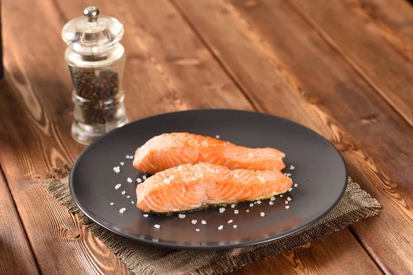 Fried Seasoned Salmon Fillet Black Plate — Stock Photo, Image