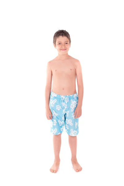 Niño con pantalones cortos de playa — Foto de Stock