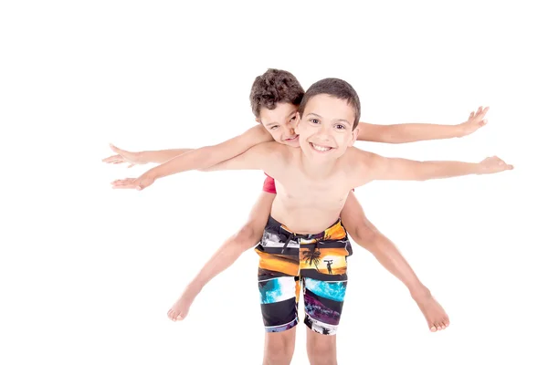 Niño con pantalones cortos de playa —  Fotos de Stock