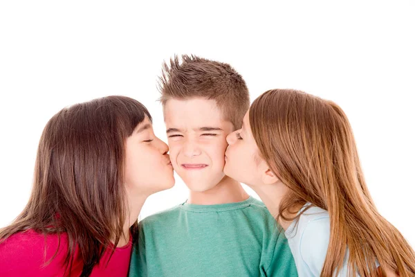 Meninas Beijando Menino Cara Isolado Branco — Fotografia de Stock