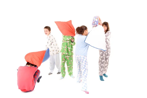 Kleine Kinderen Hun Pyjama Met Kussen Gevechten Geïsoleerd Wit — Stockfoto