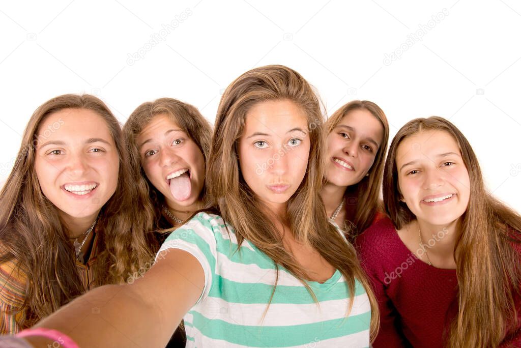 teenage girls taking selfies isolated in white background