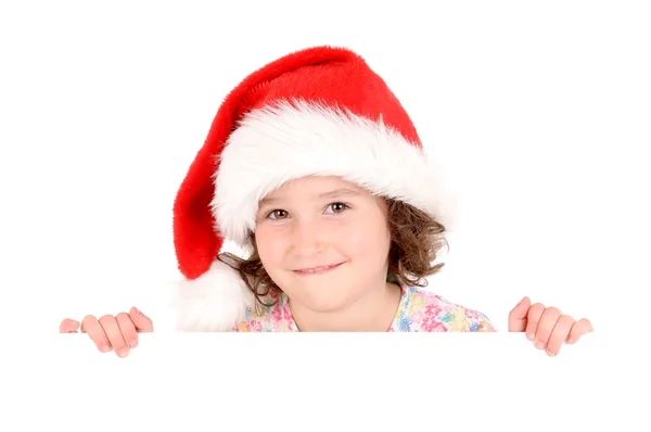 Little girl with Christmas hat Stock Image