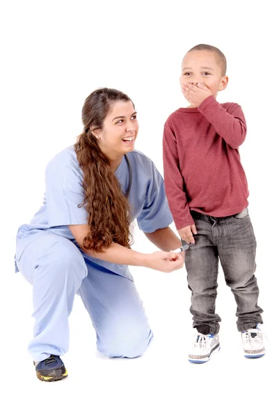 Детский врач с мальчиком — стоковое фото