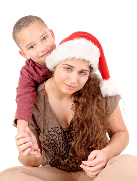 Donna con ragazzo a Natale — Foto Stock