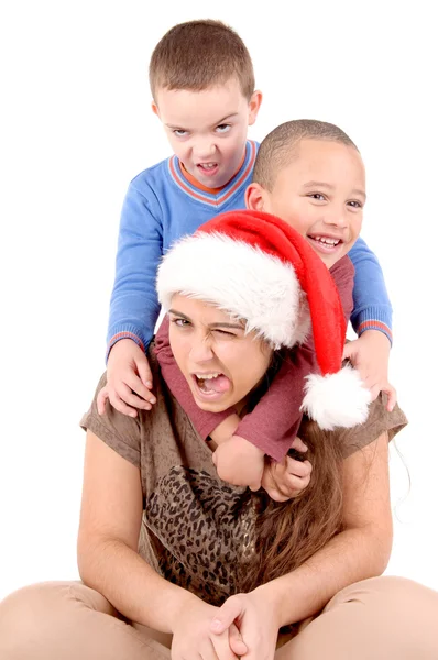 Žena s chlapci na Vánoce — Stock fotografie