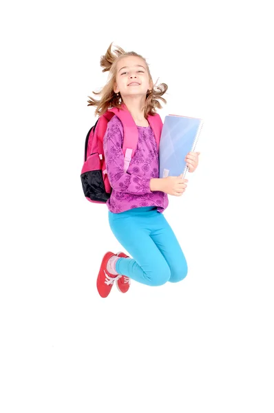 Menina na escola saltando — Fotografia de Stock