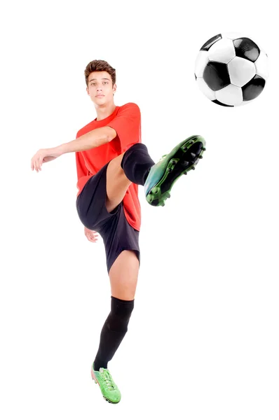 Pojke spelar fotboll — Stockfoto