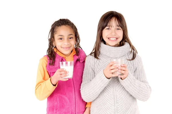 Girls drinking milk — Stock Photo, Image