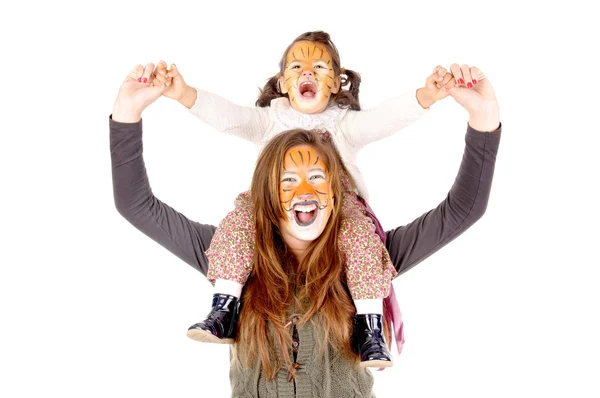 Sisters with face painted as tigers — Stock Photo, Image