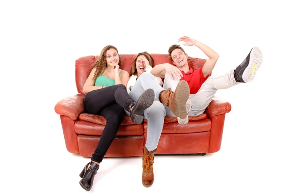 Friends sitting on a couch — Stock Photo, Image