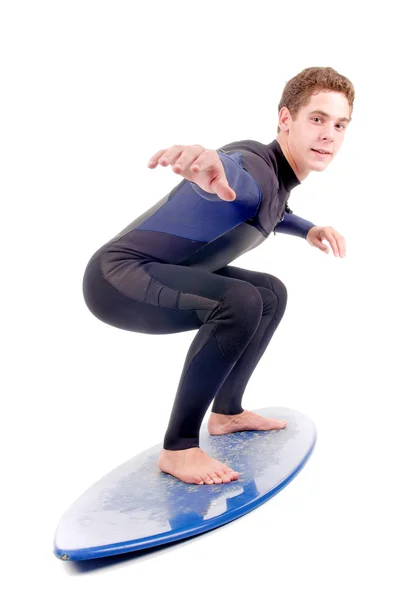 Mladý surfař pózuje — Stock fotografie
