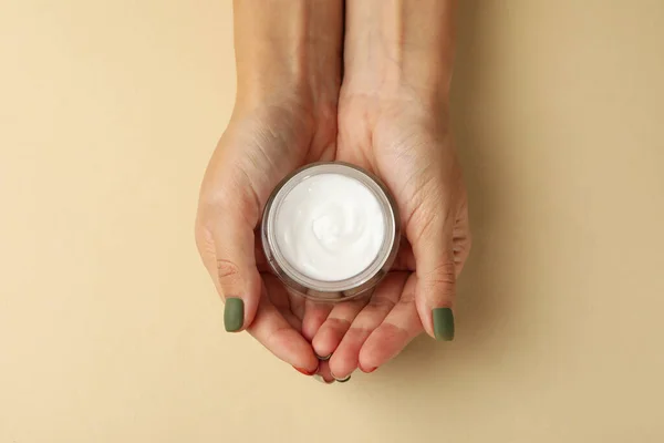 Female Hands Cosmetic Cream Beige Background — Stock Photo, Image