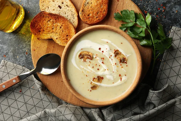 Concept of tasty lunch with bowl of mushroom soup on black smoky background — Stock Image Concept Tasty Lunch Bowl Mushroom Soup Black Smoky Background Stock Image
