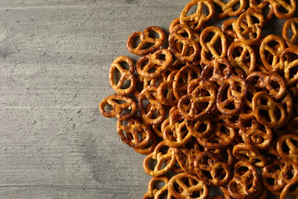 Bunch Tasty Cracker Pretzels Gray Background — Stock Photo, Image