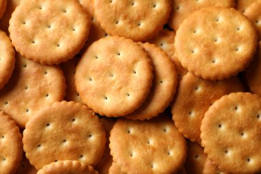 Tüm arka planda lezzetli bisküviler, yakın plan.