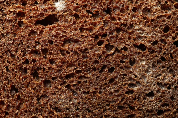 Frisch Gebackenes Dunkles Brot Auf Ganzem Hintergrund Nahaufnahme — Stockfoto