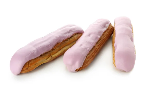 Deliciosos Eclairs Com Creme Isolado Sobre Fundo Branco — Fotografia de Stock