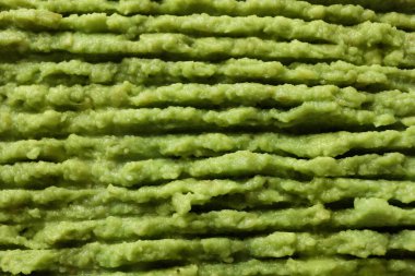 Arka planda taze guacamole dokusu, kapatın.