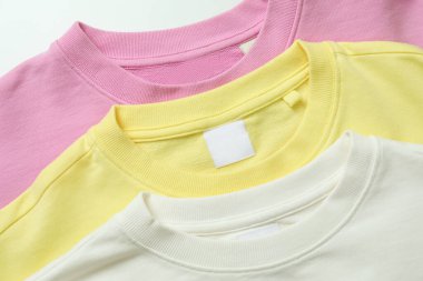 Sarı, pembe ve beyaz kazaklar, yaklaşın.