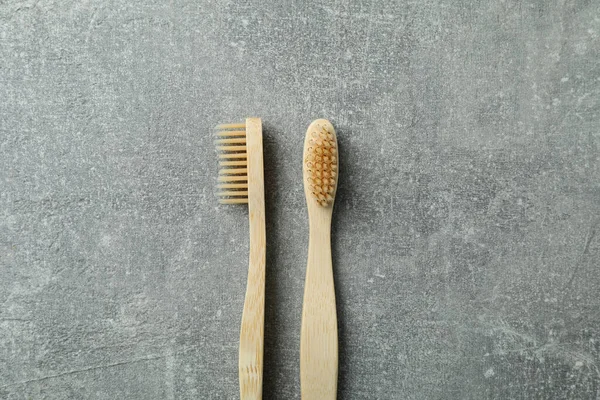Οικολογικές Ξύλινες Οδοντόβουρτσες Γκρι Φόντο — Φωτογραφία Αρχείου