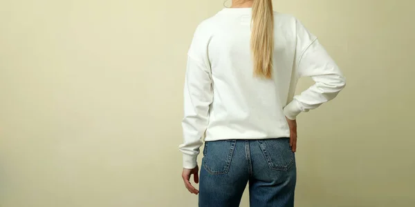 Young Woman White Sweatshirt Beige Background — Stock Photo, Image