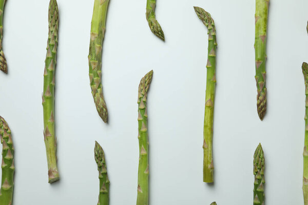 Fresh green asparagus on white background, top view