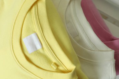 Sarı, pembe ve beyaz kazaklar, yaklaşın.