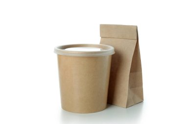 Blank paper bag and food cup isolated on white background