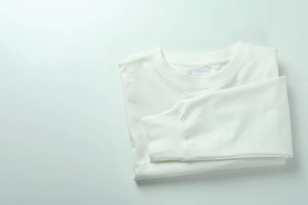 Gevouwen Sweater Witte Achtergrond Ruimte Voor Tekst — Stockfoto