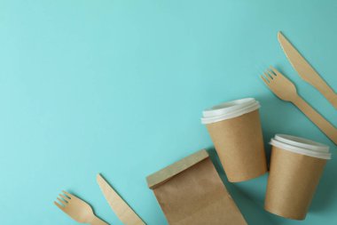 Food delivery disposable tableware on blue background